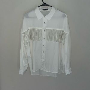 White top — silver fringe